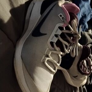Pinky and Sliver Nike athletic size 6 shoes